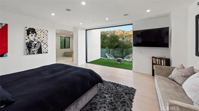 a view of a house with a tree