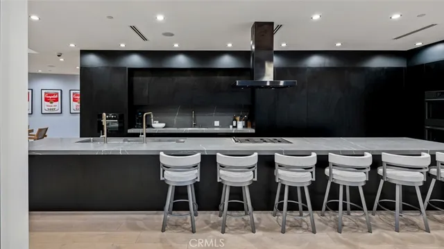 a view of a dining room with furniture and a rug