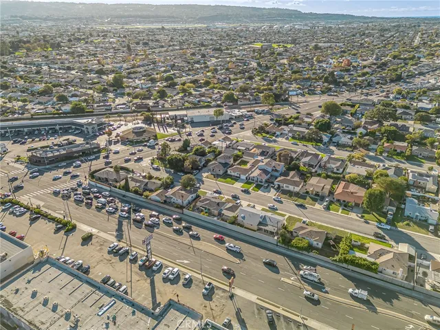 an aerial view of residential building and ocean view