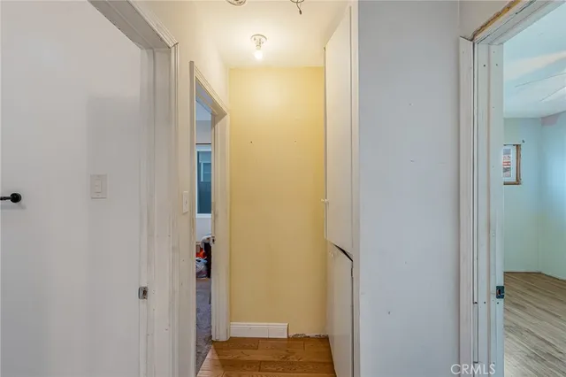 a view of livingroom with hardwood floor and ceiling fan