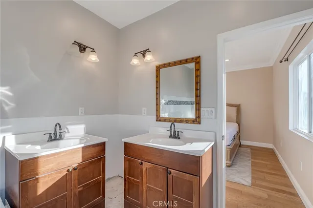 a bathroom with a shower a toilet and a sink