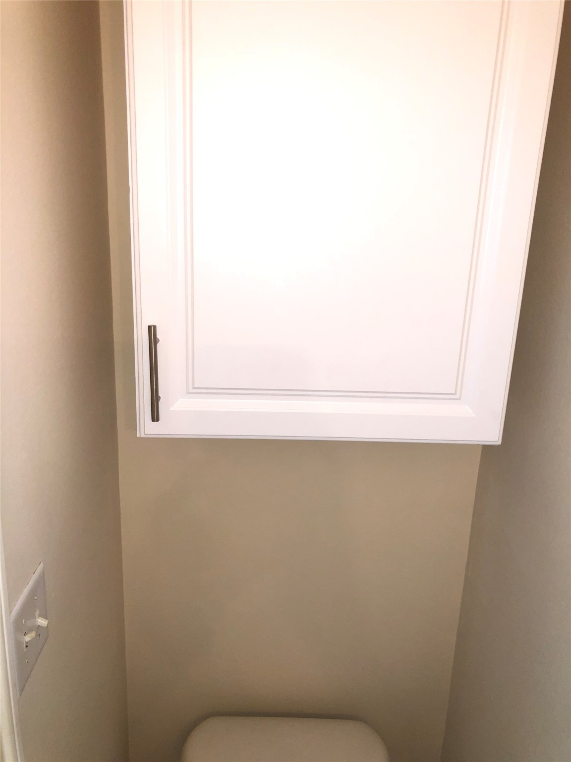 5639 Stonecloud Lane Katy, TX 77494 - Photo 31 of 43 Downstairs 1/2 Bath with above toilet storage cabinet.