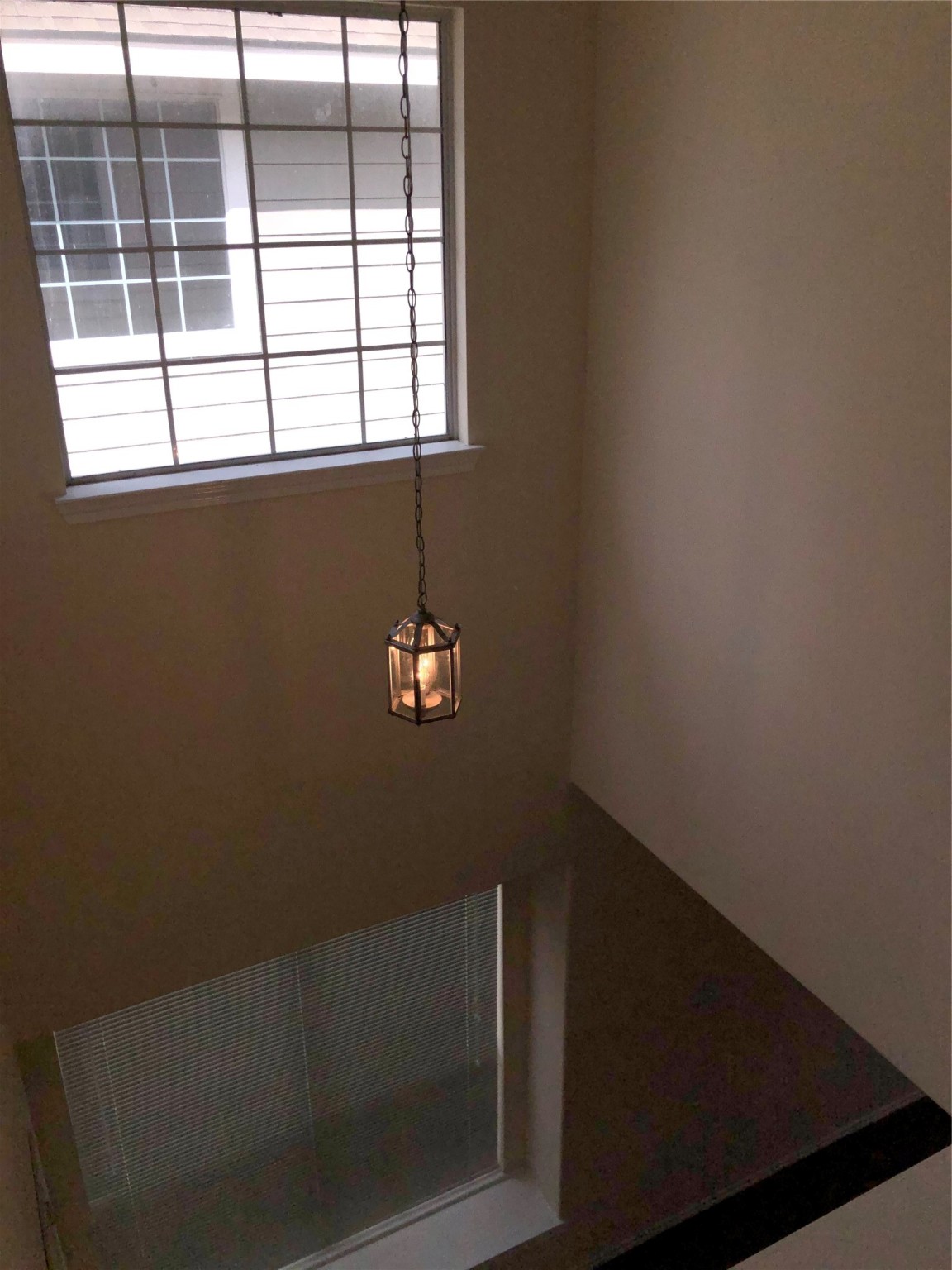 5639 Stonecloud Lane Katy, TX 77494 - Photo 36 of 43 A look from upstairs at the high ceilings in the two story foyer/entryway.