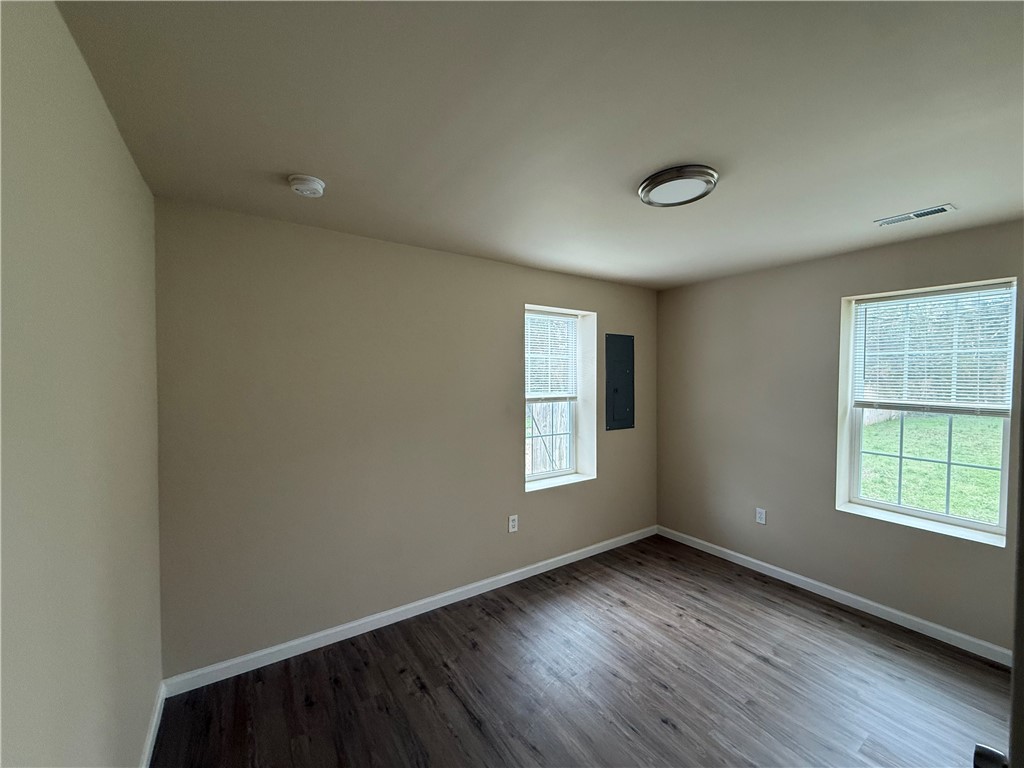 620 East Orr Street Anderson, SC 29621 - Photo 11 of 22 This versatile room features durable flooring and ample natural light, ideal for a peaceful retreat.