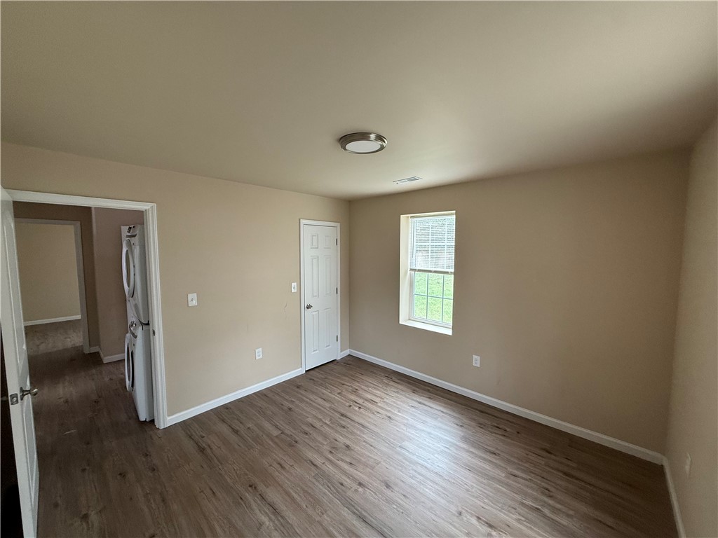 620 East Orr Street Anderson, SC 29621 - Photo 14 of 22 This versatile room features durable flooring, offering a flexible space for diverse living arrangements.