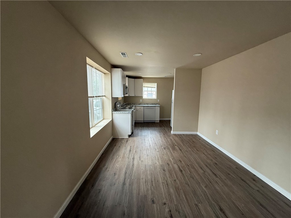 620 East Orr Street Anderson, SC 29621 - Photo 15 of 22 This inviting space combines living and kitchen areas for seamless daily routines.