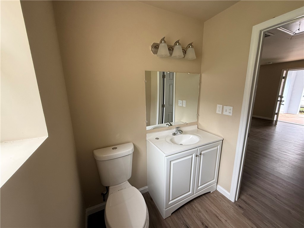 620 East Orr Street Anderson, SC 29621 - Photo 9 of 22 This bathroom features a contemporary vanity and a window, offering both style and practicality.
