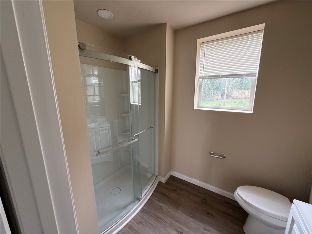 620 East Orr Street Anderson, SC 29621 - Photo 10 of 22 This bright bathroom features durable flooring and a refreshing shower enclosure.