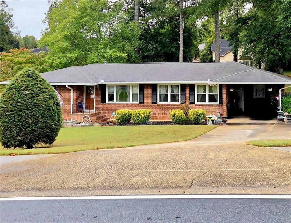 1275 Clay Road Southwest Mableton, GA 30126 - Photo 1 of 1 front view of a house with a yard