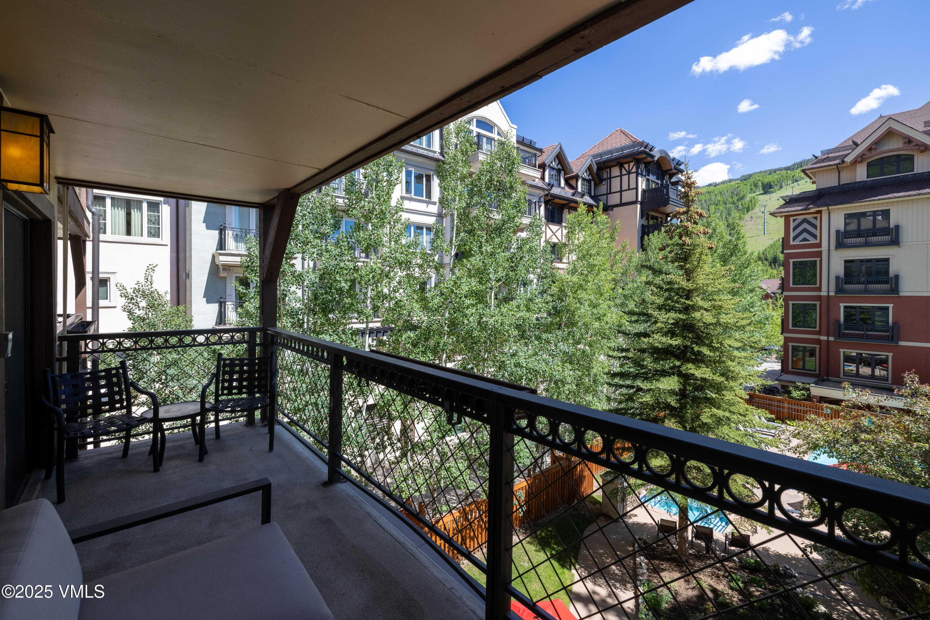684 West Lionshead Circle, Unit 304 Vail, CO 81657 - Photo 14 of 26 2506_montaneros_304_exterior_deck_summer