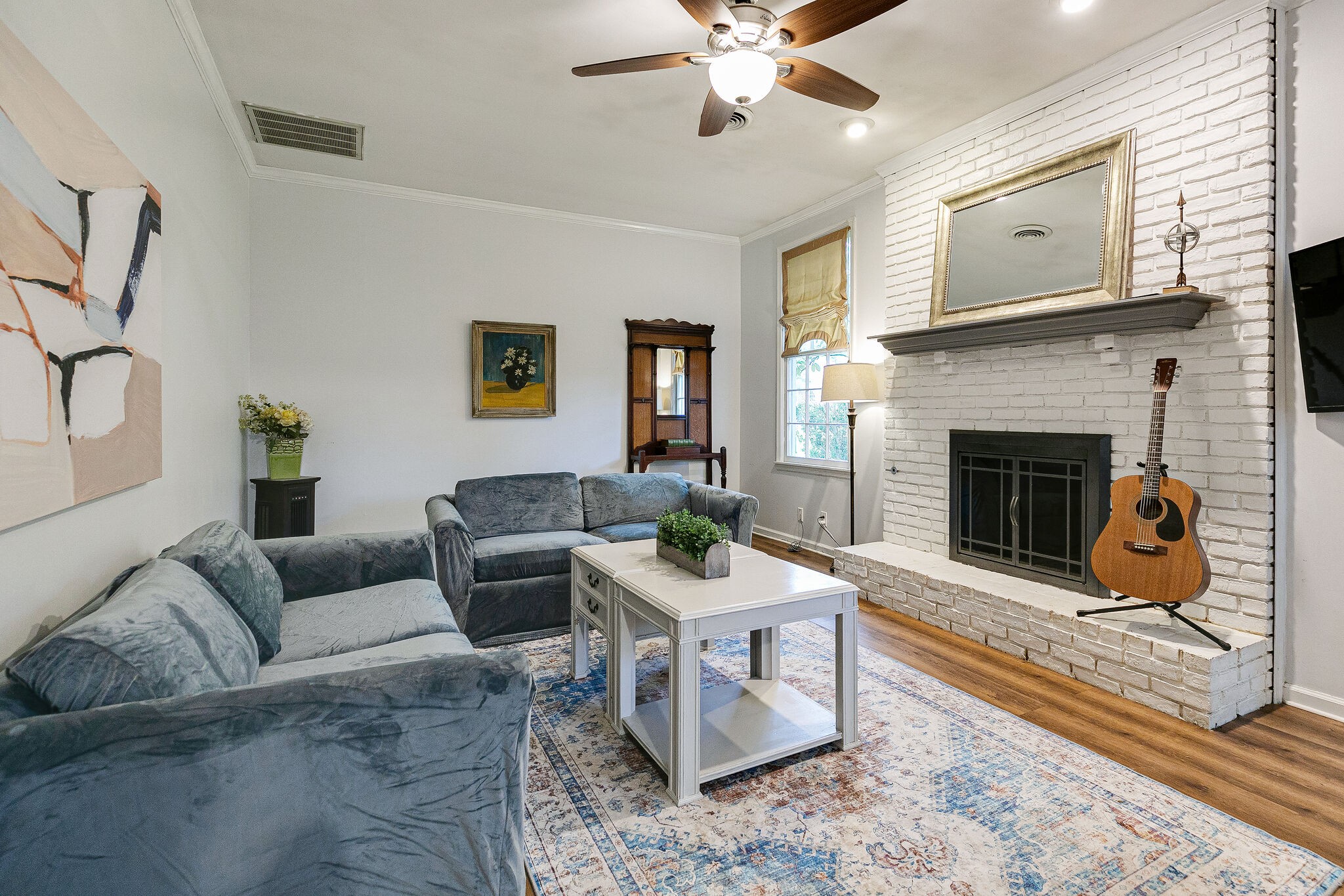 212 Gloucester Street Franklin, TN 37064 - Photo 12 of 23 a living room with furniture and a fireplace
