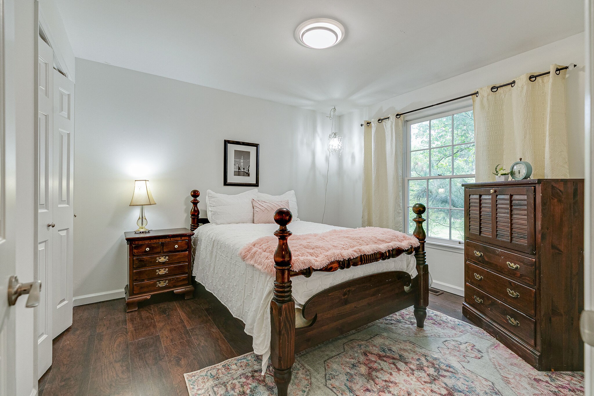 212 Gloucester Street Franklin, TN 37064 - Photo 16 of 23 a bedroom with a bed and wooden floor