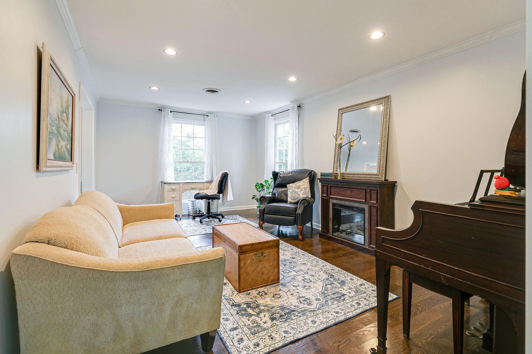 212 Gloucester Street Franklin, TN 37064 - Photo 7 of 23 a living room with furniture a piano and a flat screen tv