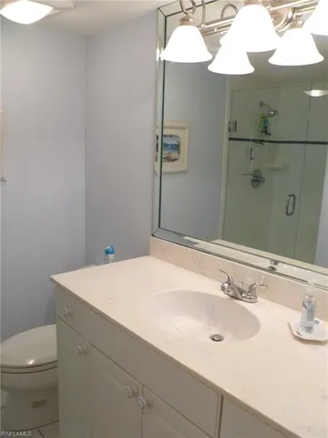 a bathroom with a sink and a toilet