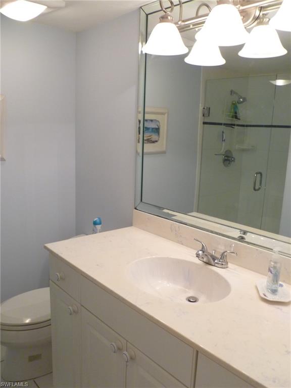 762 San Marco Road, Unit 4108 Marco Island, FL 34145 - Photo 13 of 19 a bathroom with a sink and a toilet