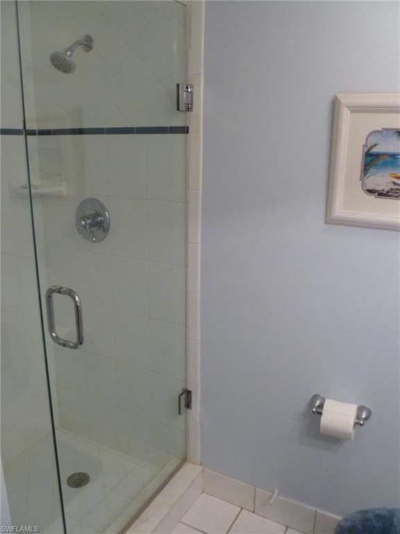 762 San Marco Road, Unit 4108 Marco Island, FL 34145 - Photo 14 of 19 a bathroom with a shower