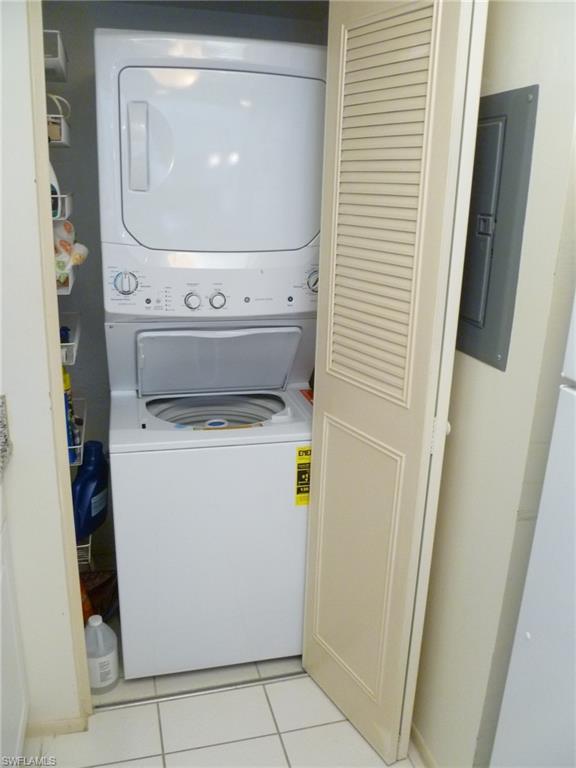 762 San Marco Road, Unit 4108 Marco Island, FL 34145 - Photo 8 of 19 a utility room with dryer and washer