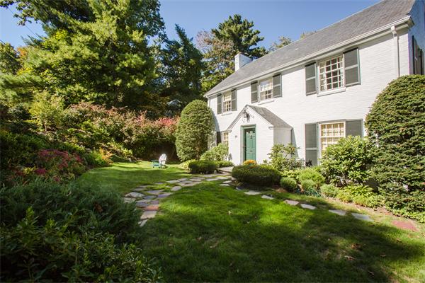 58 Lincoln Road Wellesley, MA 02481 - Photo 2 of 15 a view of a house with a yard and sitting area