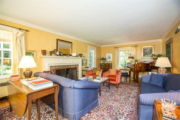 58 Lincoln Road Wellesley, MA 02481 - Photo 4 of 15 a living room with furniture and a fireplace