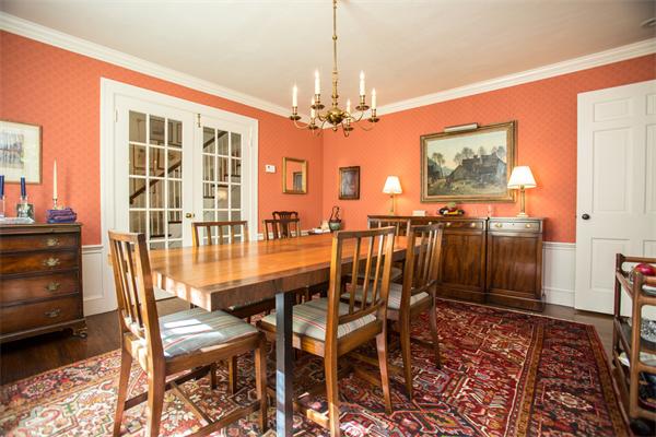 58 Lincoln Road Wellesley, MA 02481 - Photo 9 of 15 a view of a dining room with furniture and chandelier