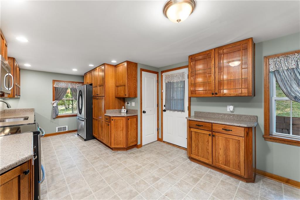 4792 Wexford Run Road Bradford Woods, PA 15015 - Photo 25 of 27 a view of a kitchen with furniture and a window