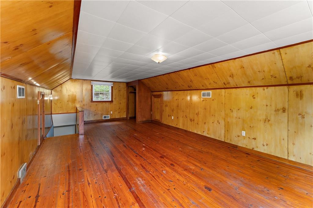 4792 Wexford Run Road Bradford Woods, PA 15015 - Photo 26 of 27 a view of a room with wooden floor