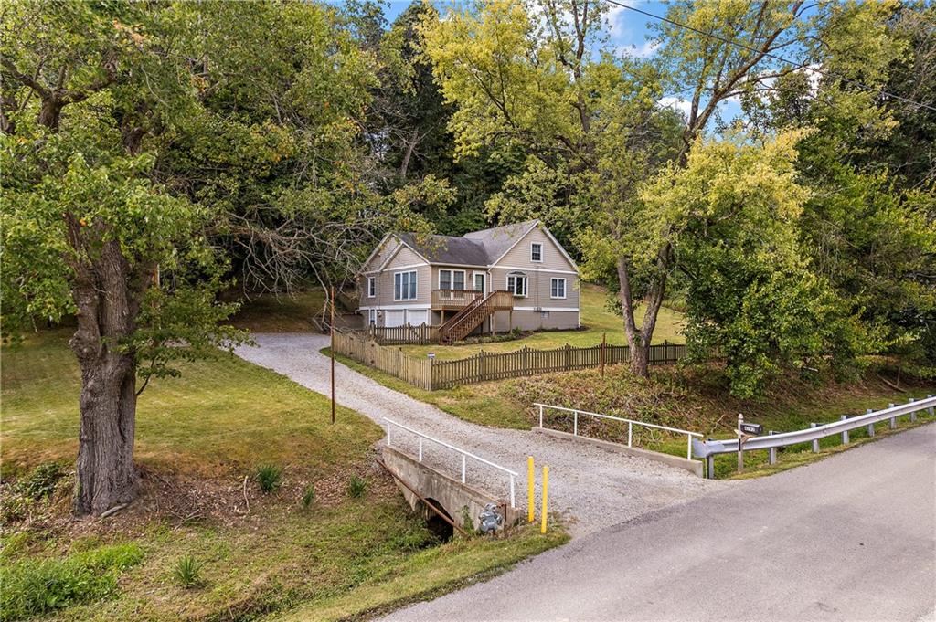 4792 Wexford Run Road Bradford Woods, PA 15015 - Photo 3 of 27 a view of a swimming pool with a patio and a yard