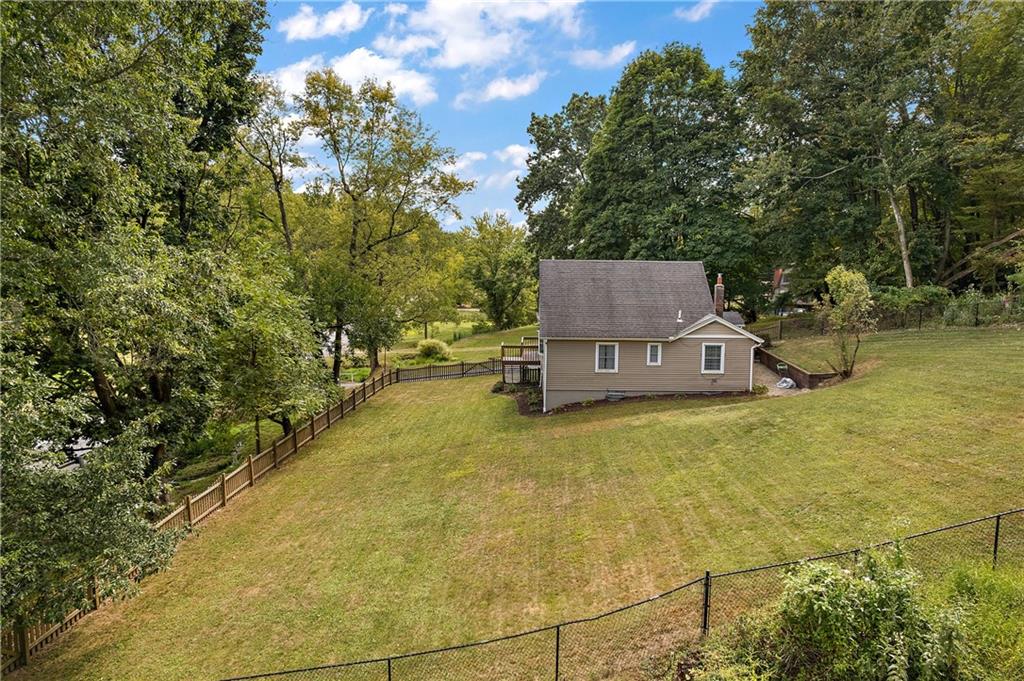 4792 Wexford Run Road Bradford Woods, PA 15015 - Photo 6 of 27 a view of a house with basketball court