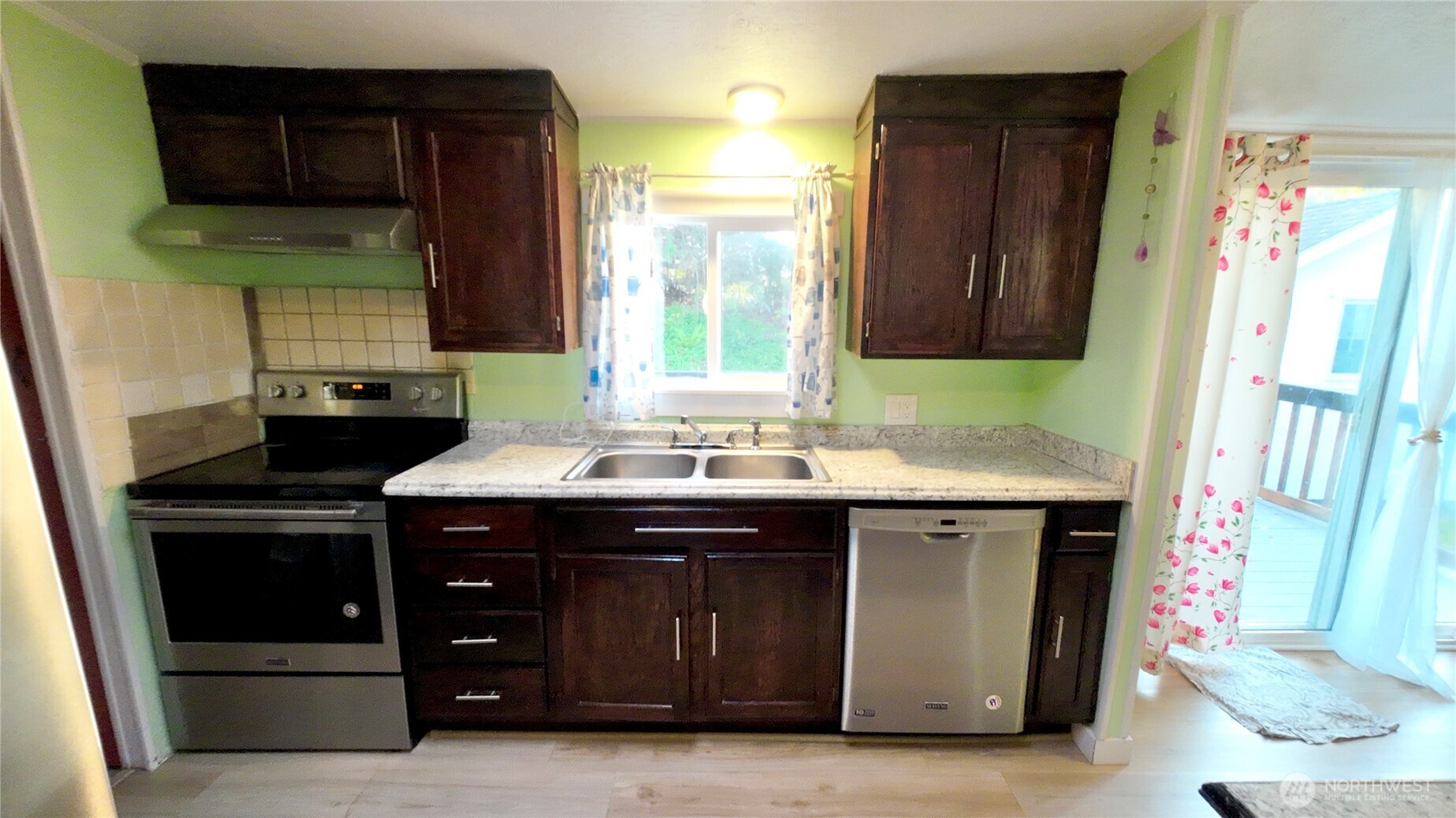 4672 Birch Bay Lynden Road, Unit 82 Blaine, WA 98230 - Photo 11 of 22 a kitchen with a sink and a cabinets