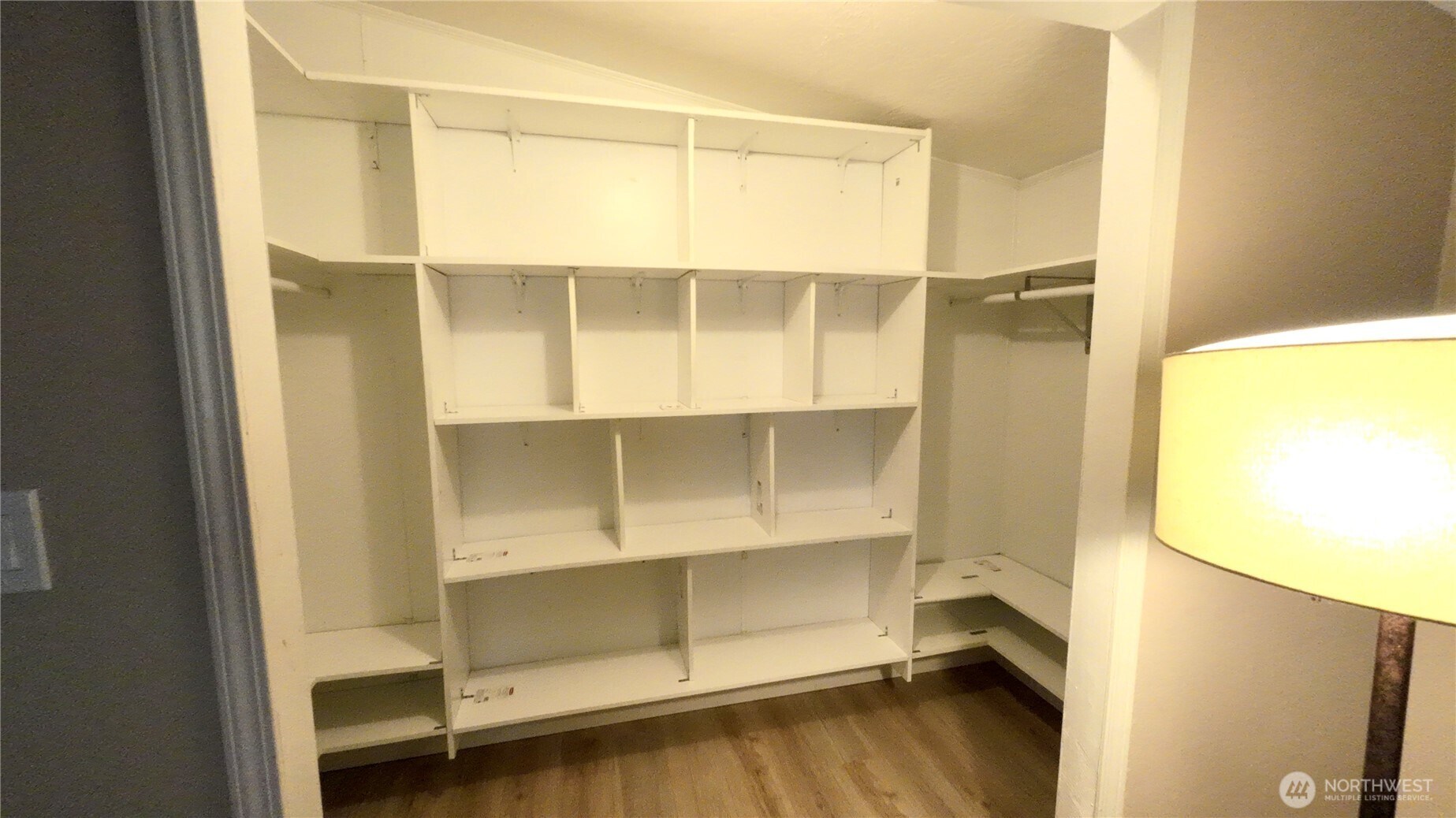 4672 Birch Bay Lynden Road, Unit 82 Blaine, WA 98230 - Photo 14 of 22 a view of walk in closet with empty racks