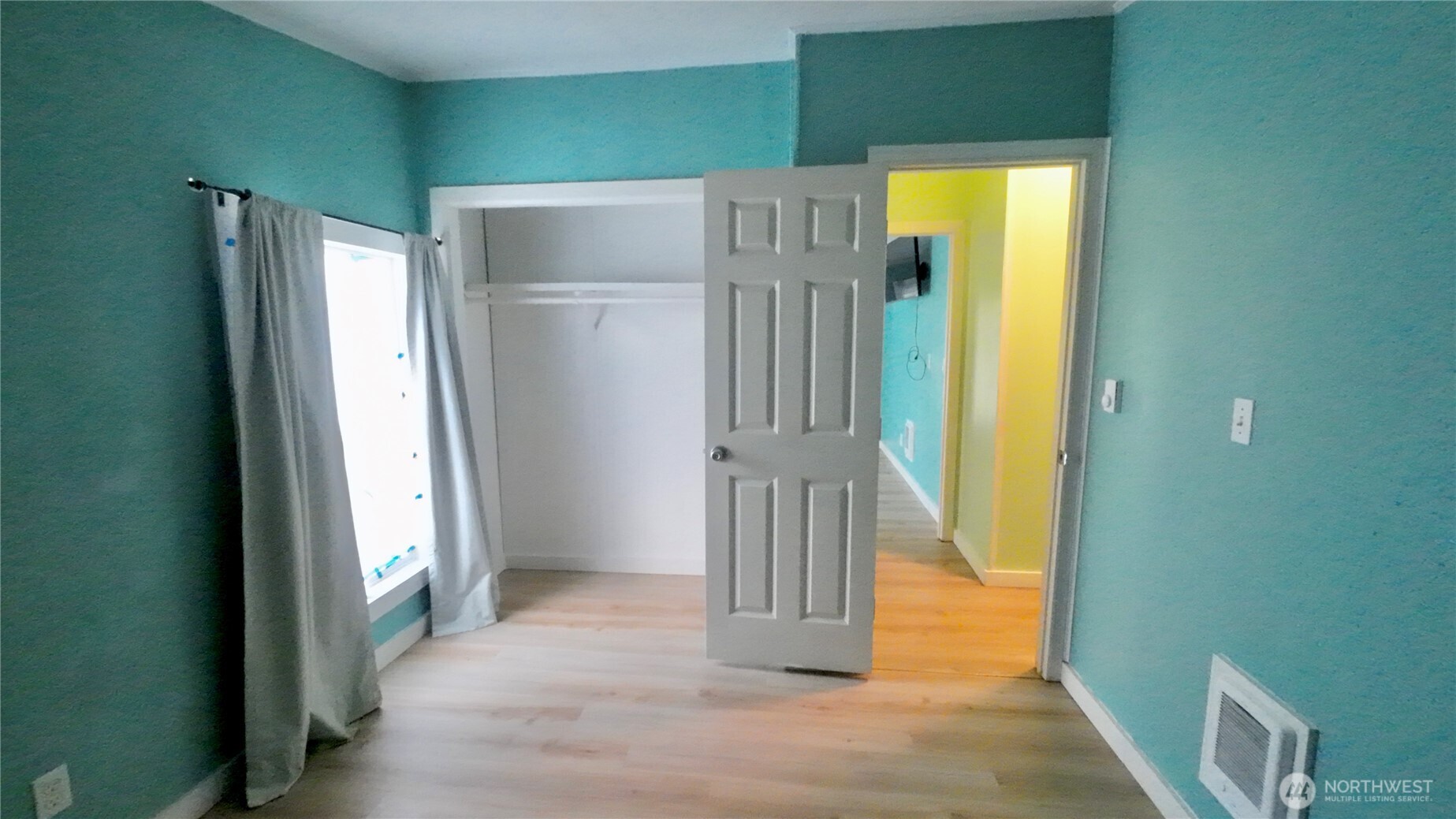 4672 Birch Bay Lynden Road, Unit 82 Blaine, WA 98230 - Photo 20 of 22 a view of a hallway with wooden shelves