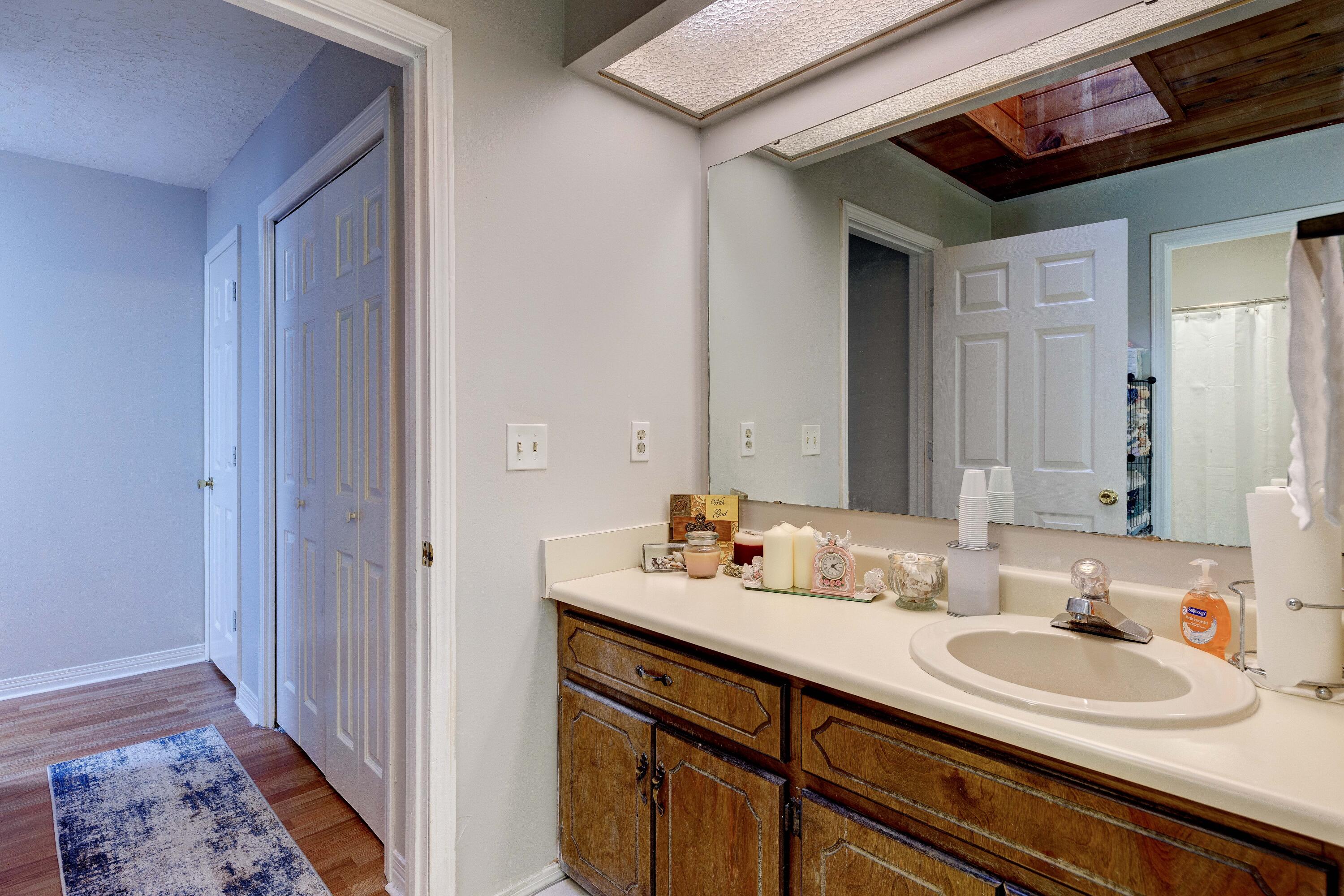 104 Fairoaks Drive Crestview, FL 32539 - Photo 15 of 24 a bathroom with a sink and a mirror
