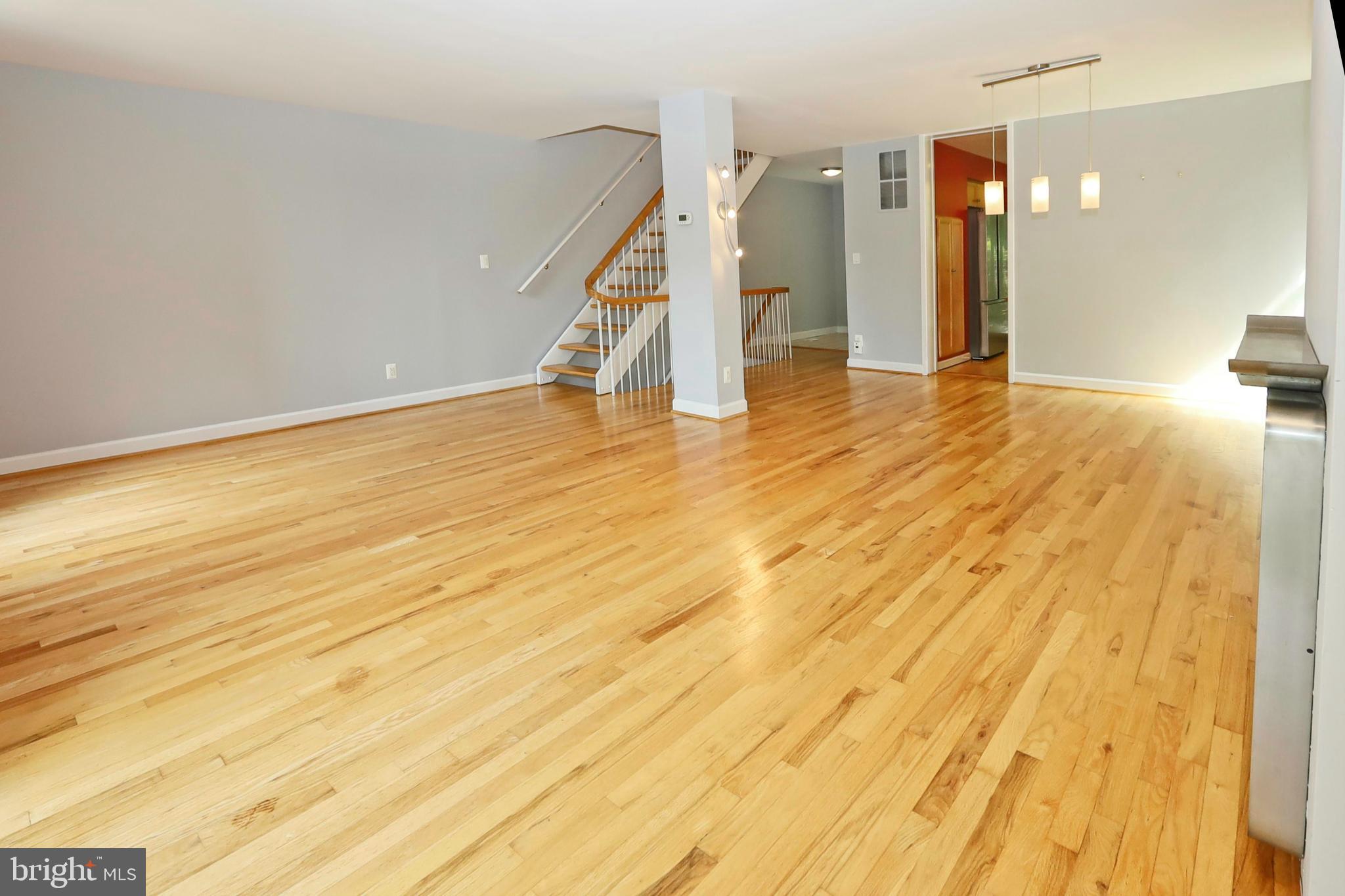 1682 Chimney House Road Reston, VA 20190 - Photo 17 of 56 Oak stairs lead to the upper level