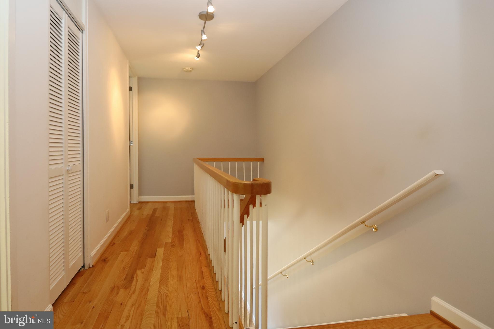 1682 Chimney House Road Reston, VA 20190 - Photo 18 of 56 Hallway to the primary suite