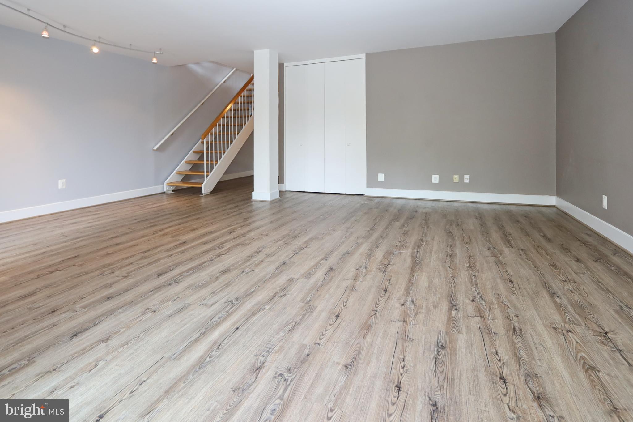 1682 Chimney House Road Reston, VA 20190 - Photo 33 of 56 Oak stairs lead to the lower level