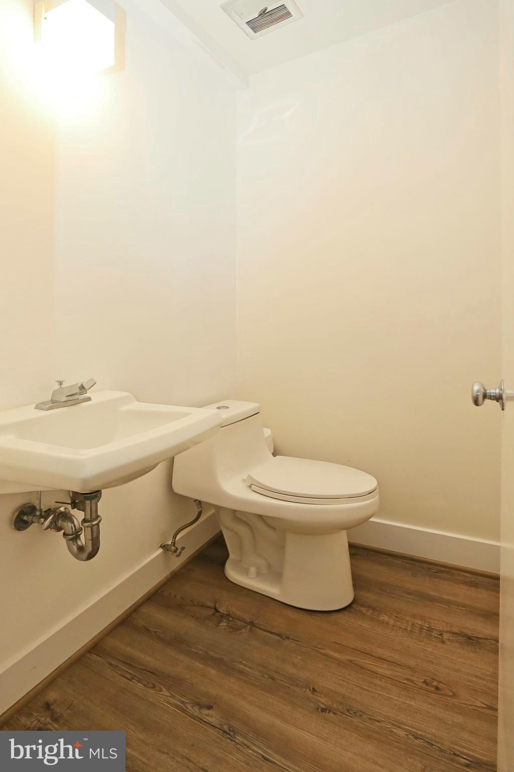 1682 Chimney House Road Reston, VA 20190 - Photo 36 of 56 A half bathroom in the lower level