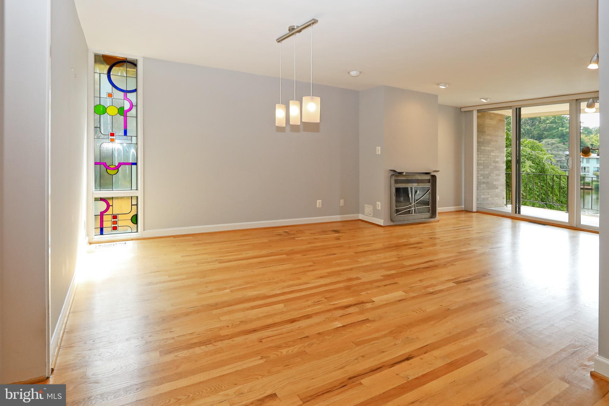 1682 Chimney House Road Reston, VA 20190 - Photo 9 of 56 Stained glass window insert in the dining room