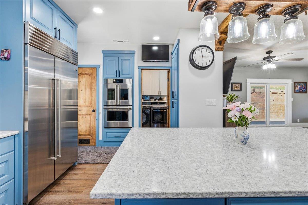 10784 Cole Way Grass Valley, CA 95945 - Photo 13 of 57 a large kitchen with stainless steel appliances granite countertop a refrigerator a oven and a sink