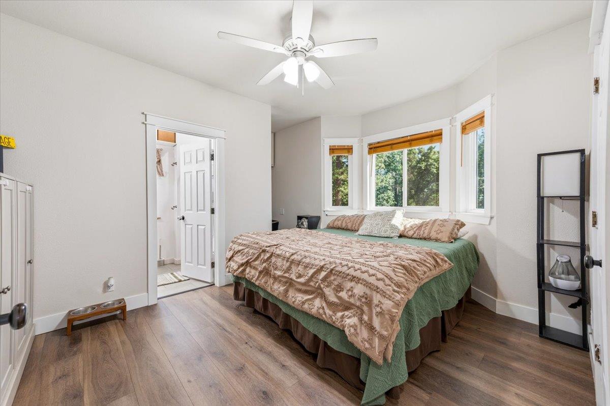 10784 Cole Way Grass Valley, CA 95945 - Photo 16 of 57 a bedroom with a bed and a window