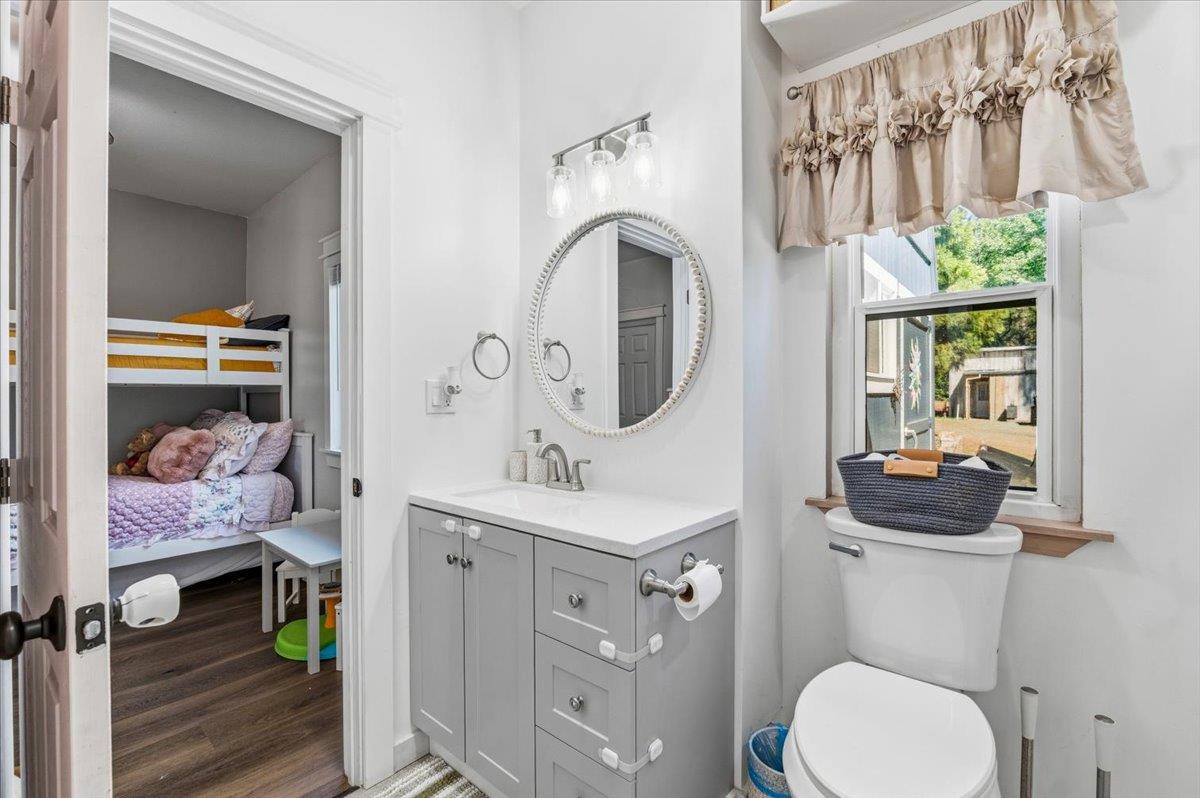 10784 Cole Way Grass Valley, CA 95945 - Photo 19 of 57 a bathroom with a sink a toilet and shower