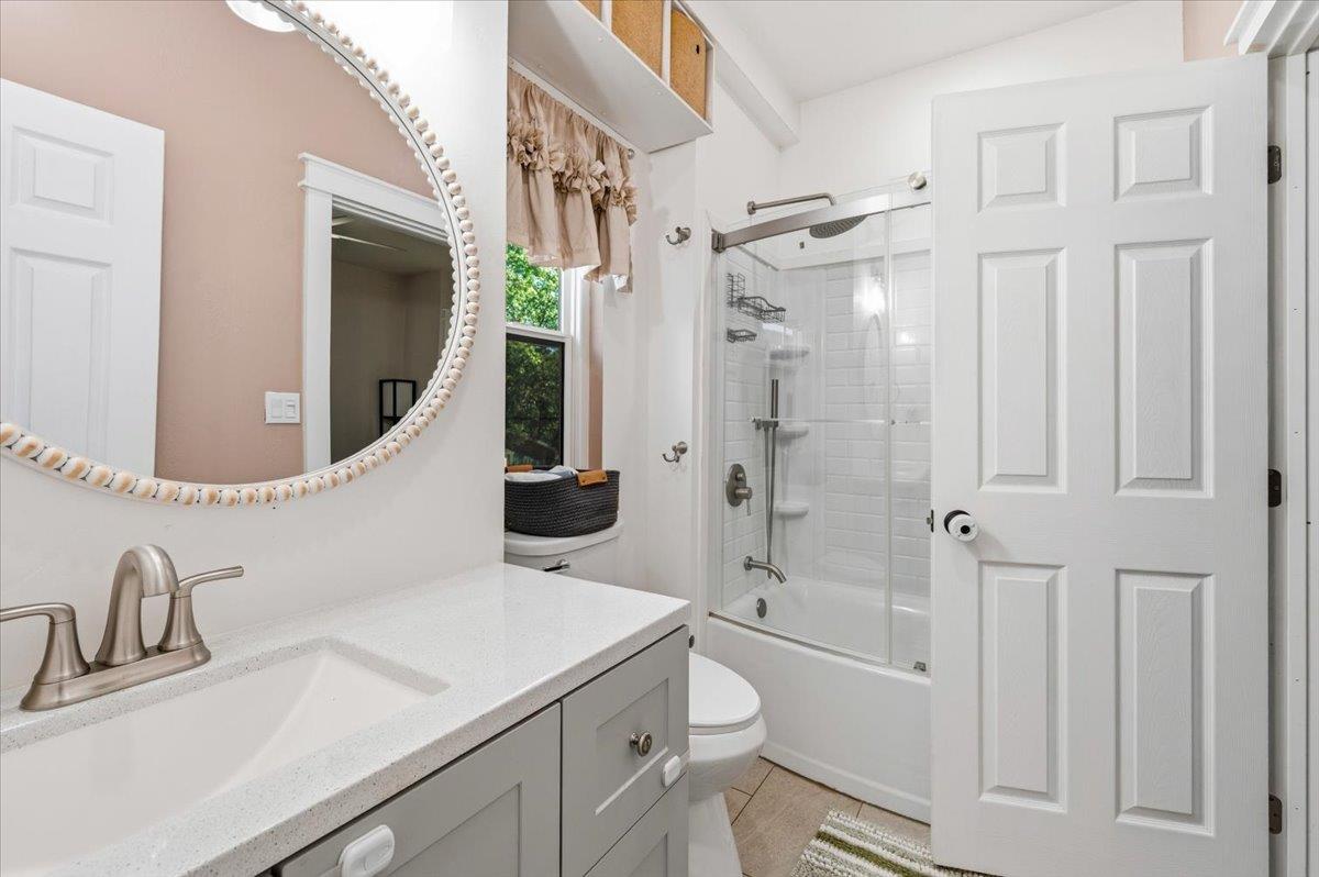 10784 Cole Way Grass Valley, CA 95945 - Photo 20 of 57 a bathroom with a sink a toilet and shower
