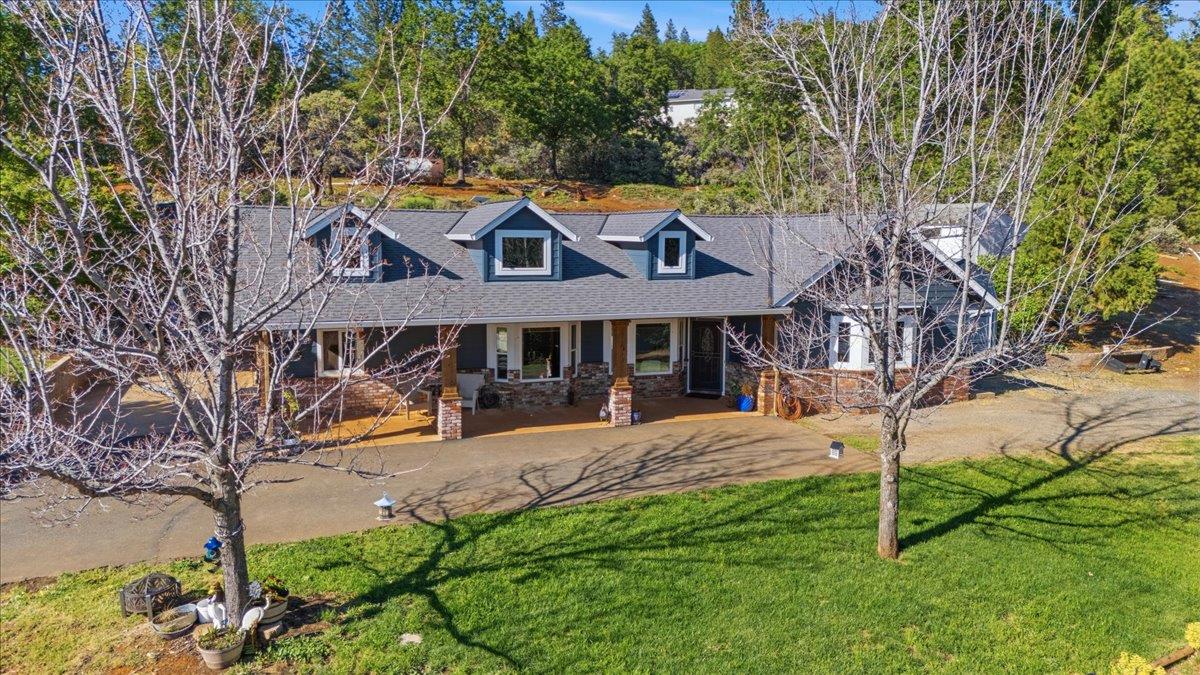 10784 Cole Way Grass Valley, CA 95945 - Photo 28 of 57 a front view of a house with a yard