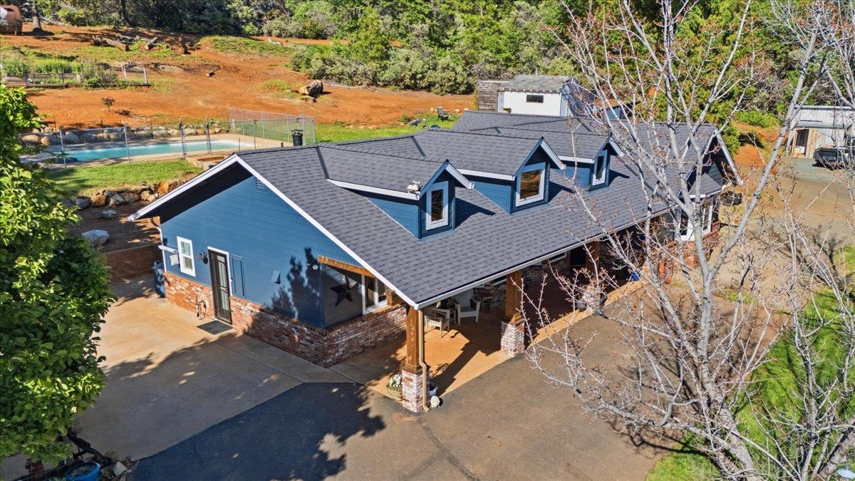10784 Cole Way Grass Valley, CA 95945 - Photo 3 of 57 an aerial view of a house with garden space and lake view