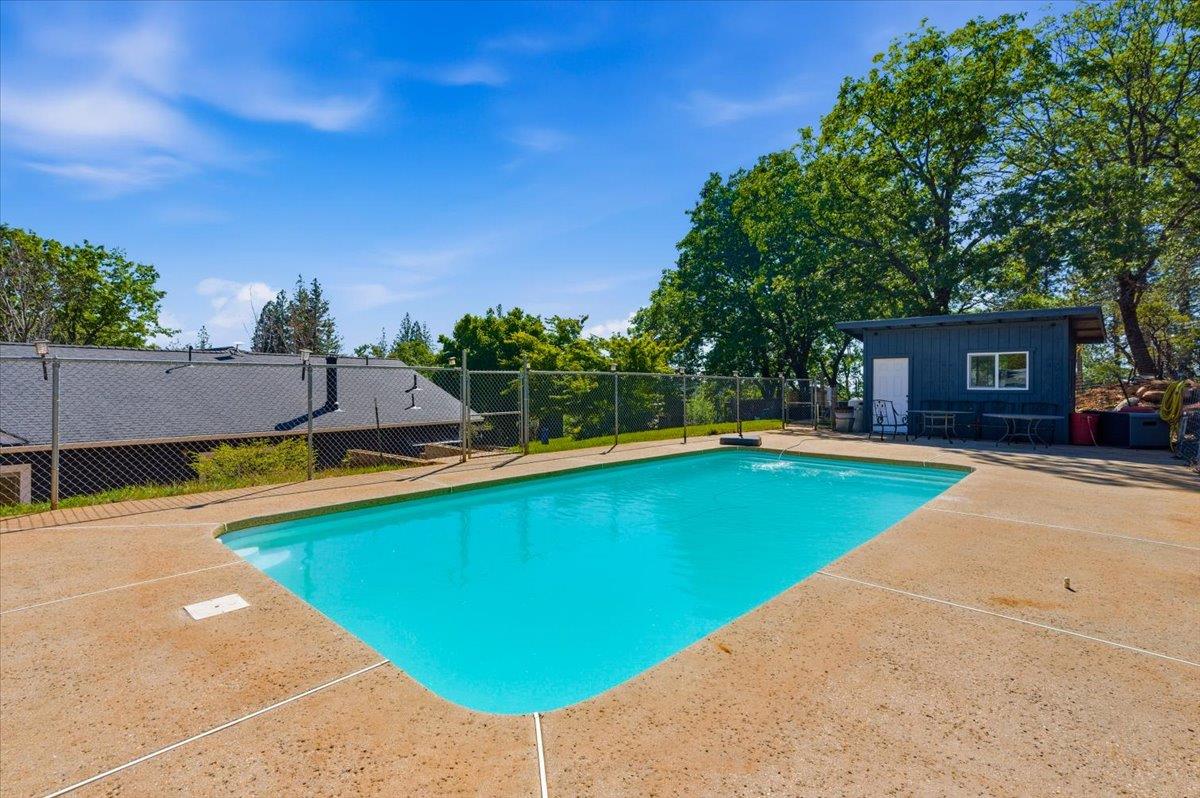 10784 Cole Way Grass Valley, CA 95945 - Photo 37 of 57 a view of swimming pool with lounge chair