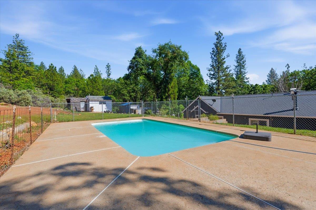 10784 Cole Way Grass Valley, CA 95945 - Photo 38 of 57 an outdoor space with pool and furniture