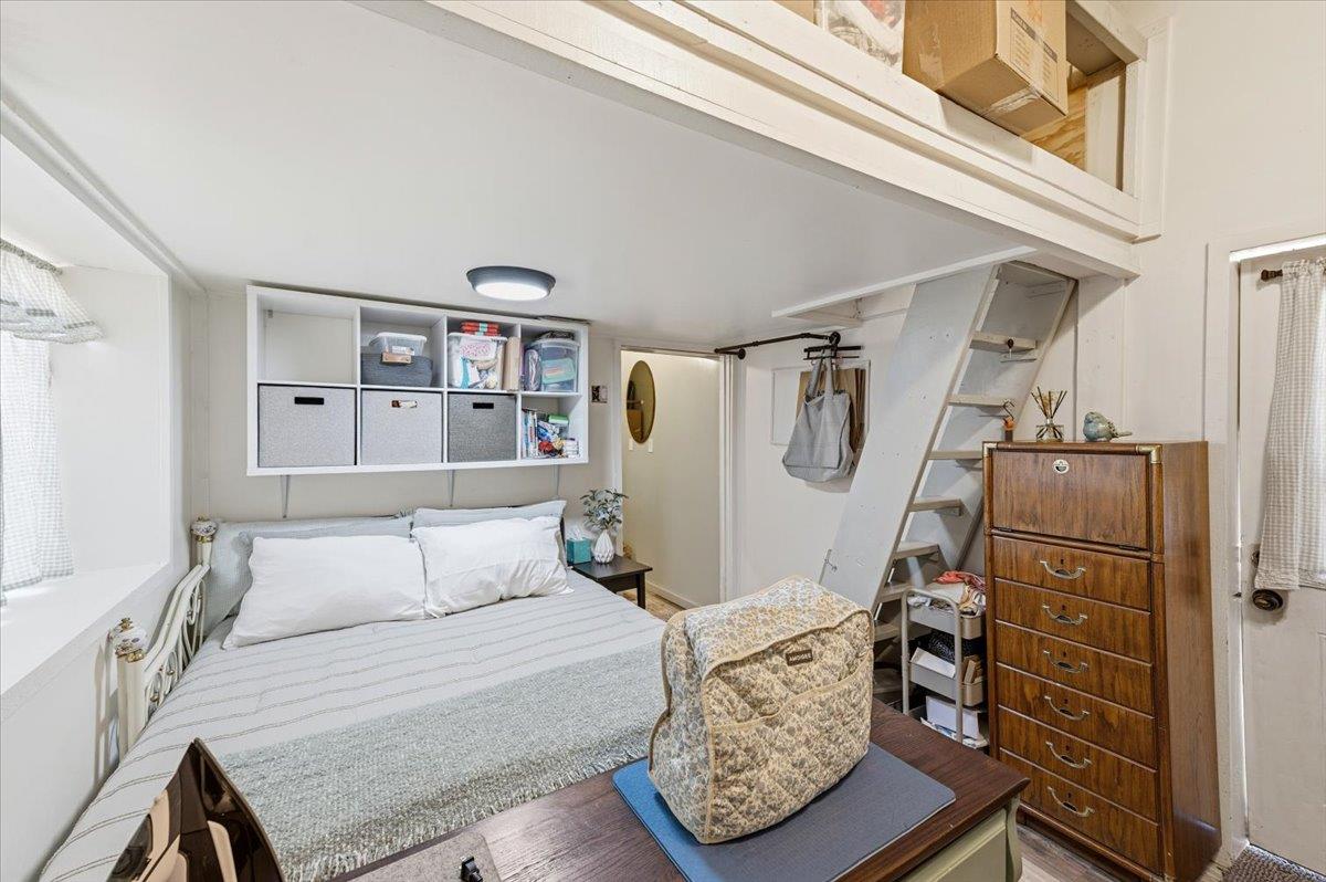 10784 Cole Way Grass Valley, CA 95945 - Photo 44 of 57 a bedroom with furniture and a window