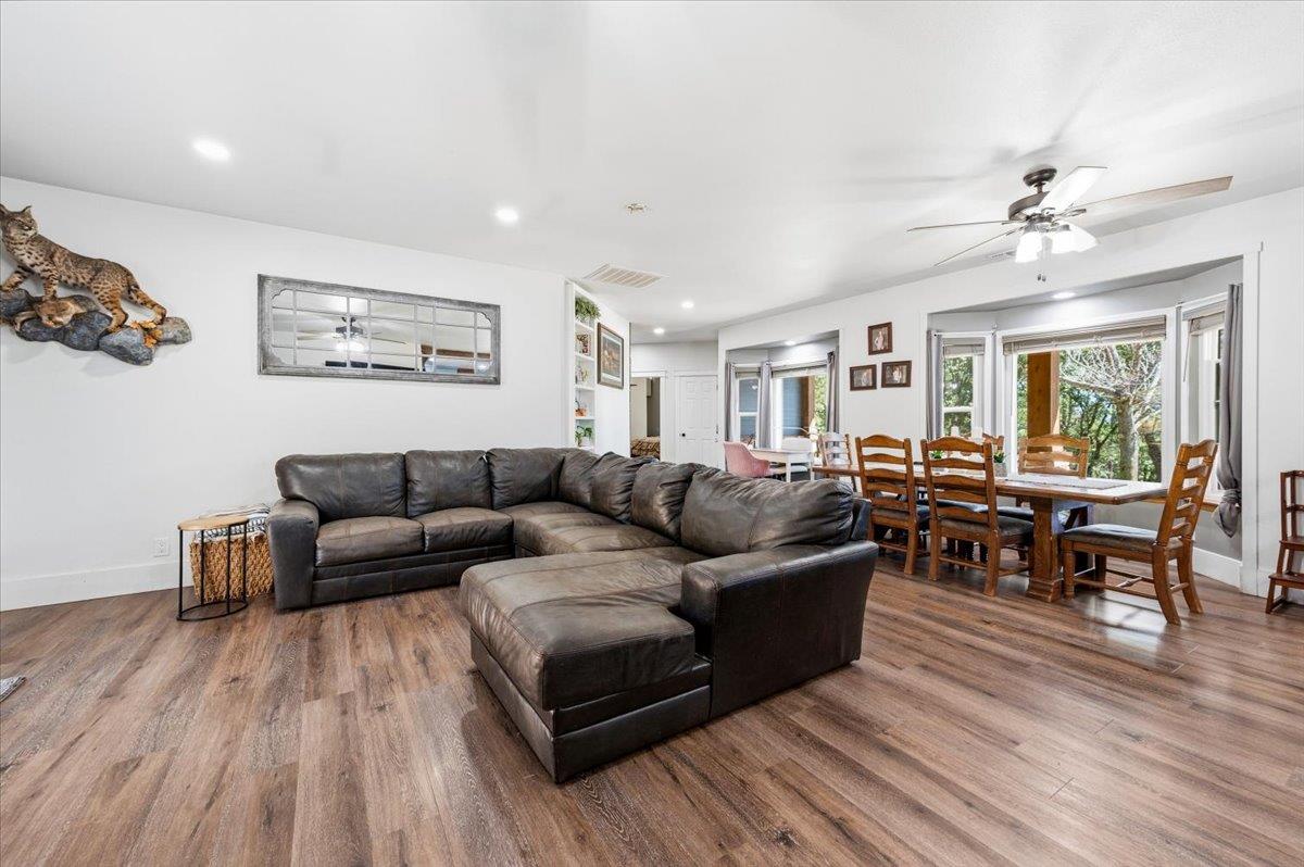 10784 Cole Way Grass Valley, CA 95945 - Photo 6 of 57 a living room with furniture and wooden floor