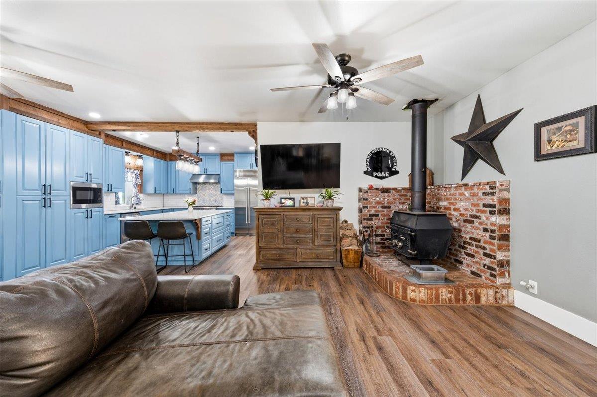 10784 Cole Way Grass Valley, CA 95945 - Photo 8 of 57 a living room with furniture and a flat screen tv