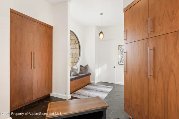 a view of living room with furniture and a window