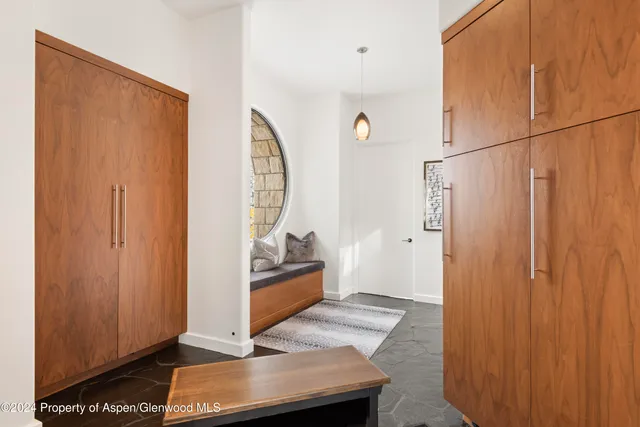 a view of living room with furniture and a window